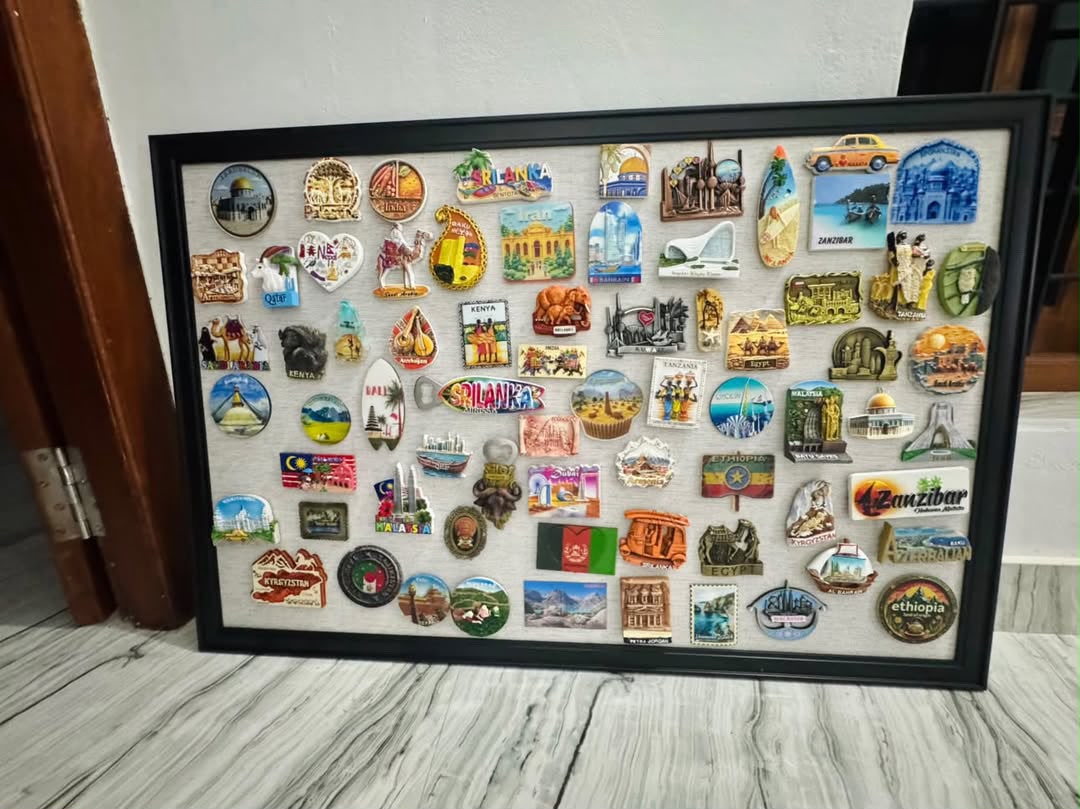 Global magnet collection pinned on Musafir Kahani magnetic board
